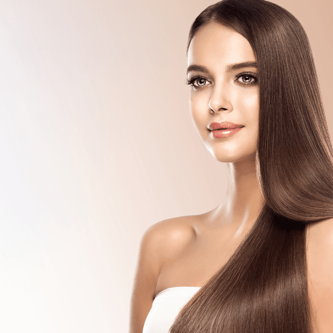 Model with smooth, glossy hair after keratin straightening at Simon Warwick Salons, Maida Vale – frizz-free results with a sleek, professional finish.